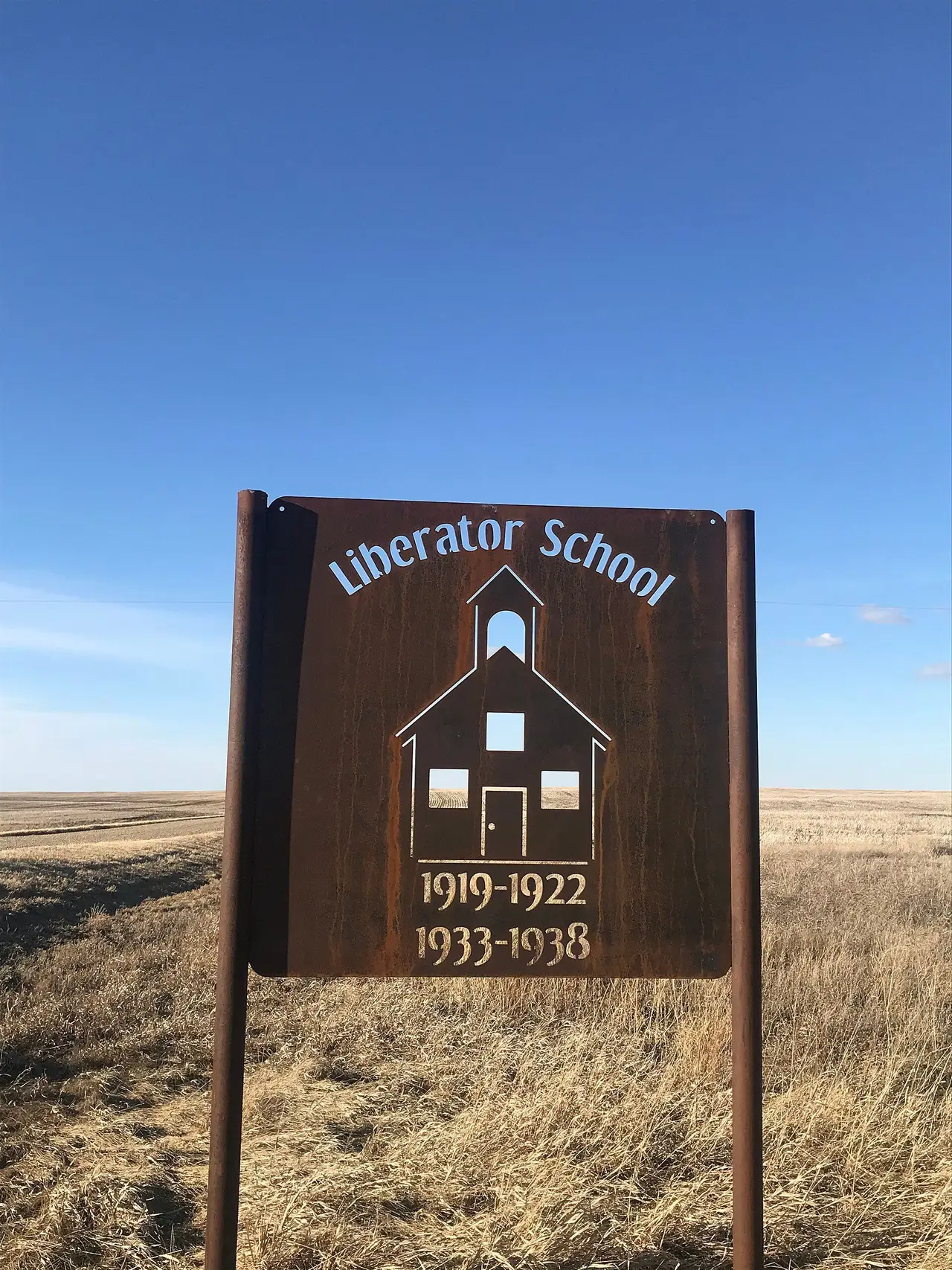Liberator School historic sign on the prairie, 2020
